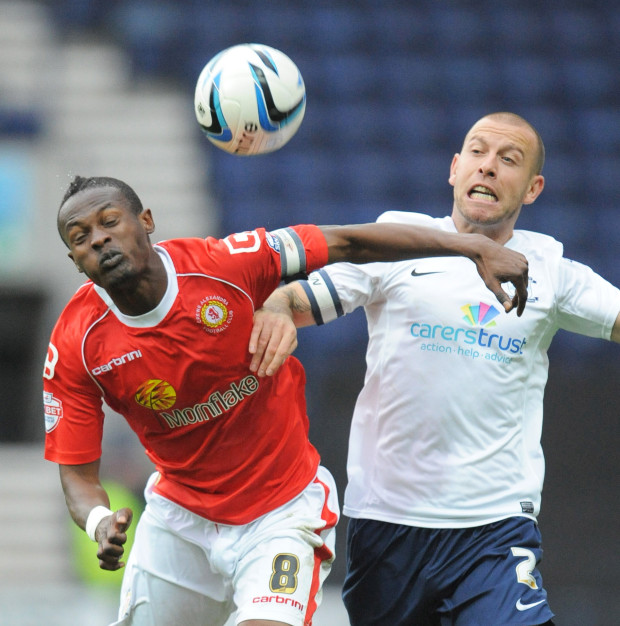 Preston's Keith Keane, right, in action