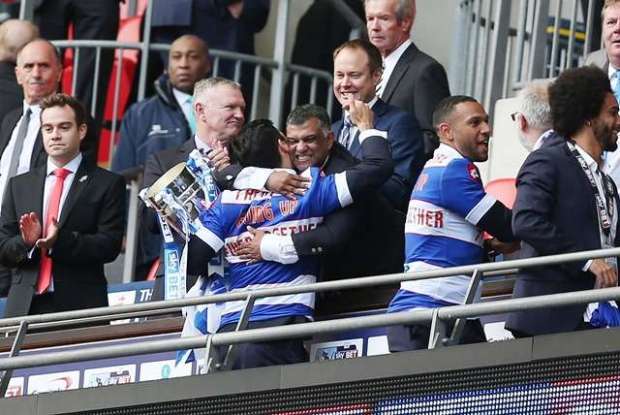 Glory times: Faurlin celebrates play-off success with chairman Tony Fernandes in 2013/14 (Action Images / Matthew Childs)