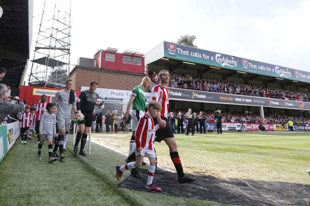 Captain Marvel: Kevin O'Connor leads Brentford out (Action Images / Andrew Couldridge)