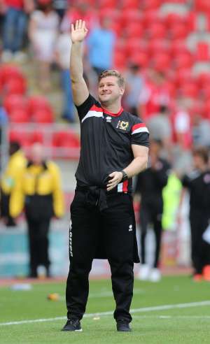 Young boss: MK Dons manager Karl Robinson (Action Images / Alex Morton)