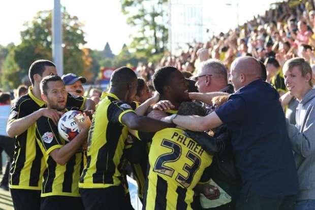 Pandemonium: Jerome Binnon-Williams scores a late minute winner against Chesterfield (Photo by Media Image)