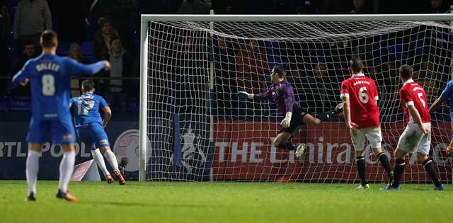On their way: Scott Fenwick breaks the deadlock in extra-time in Pools' 2-0 second round replay win over Salford City (photo by Action Images / John Clifton)