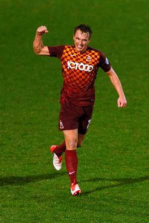 Football - Bradford City v Aldershot Town - FA Cup First Round Replay - Coral Windows Stadium, Valley Parade - 18/11/15 Bradford City's Tony McMahon celebrates scoring their second goal from the penalty spot Mandatory Credit: Action Images / Jason Cairnduff Livepic EDITORIAL USE ONLY. No use with unauthorized audio, video, data, fixture lists, club/league logos or "live" services. Online in-match use limited to 45 images, no video emulation. No use in betting, games or single club/league/player publications. Please contact your account representative for further details.