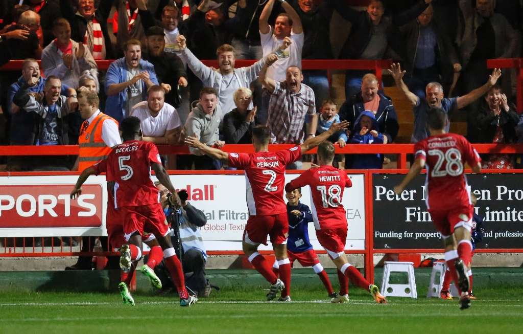 Matty Peason celebrates after his memorable last-gasp winner against Burnley
