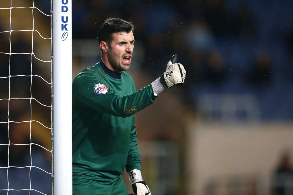 Goalkeeper's union: Jensen's best friend at the club, Scott Shearer (Picture: Action Images)