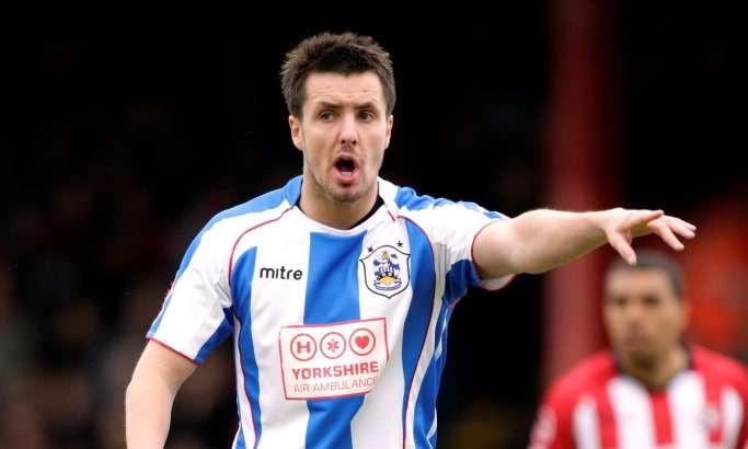 Terrier Times: Collins spent a satisfying spell at Huddersfield. (Picture: Action Images)