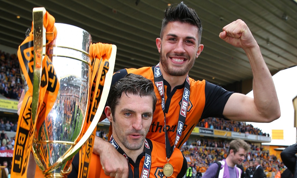 Party time: Sam Ricketts and Danny Batth celebrate Wolves' promotion to the Championship