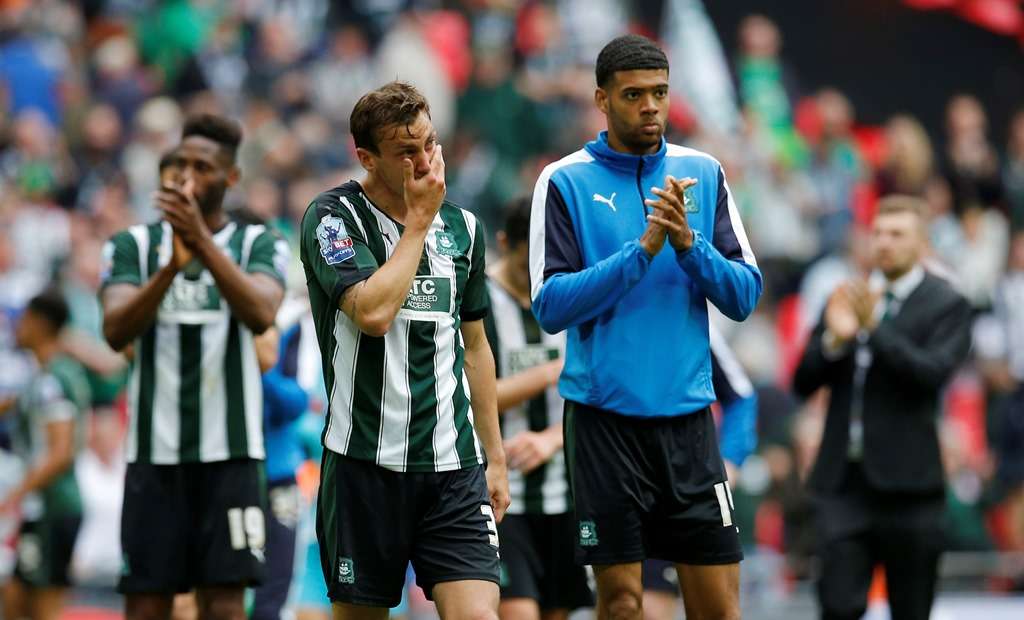 Wembley woe: A dejected Gary Sawyer and stunned Jake Jervis applaud Argyle fans (photo by Action Images)