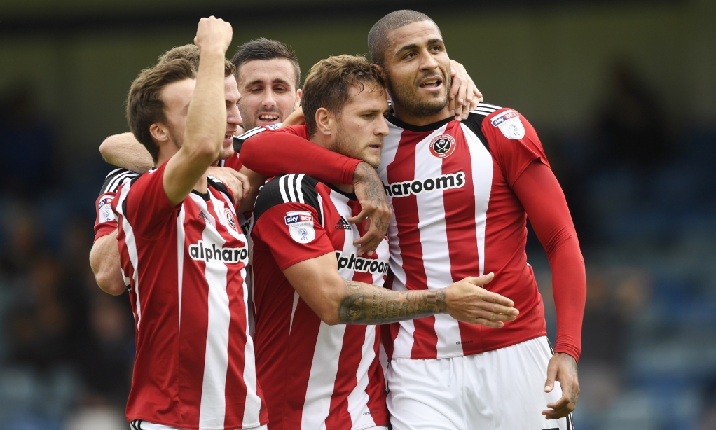 Good times: Billy Sharp celebrates scoring against Gillingham