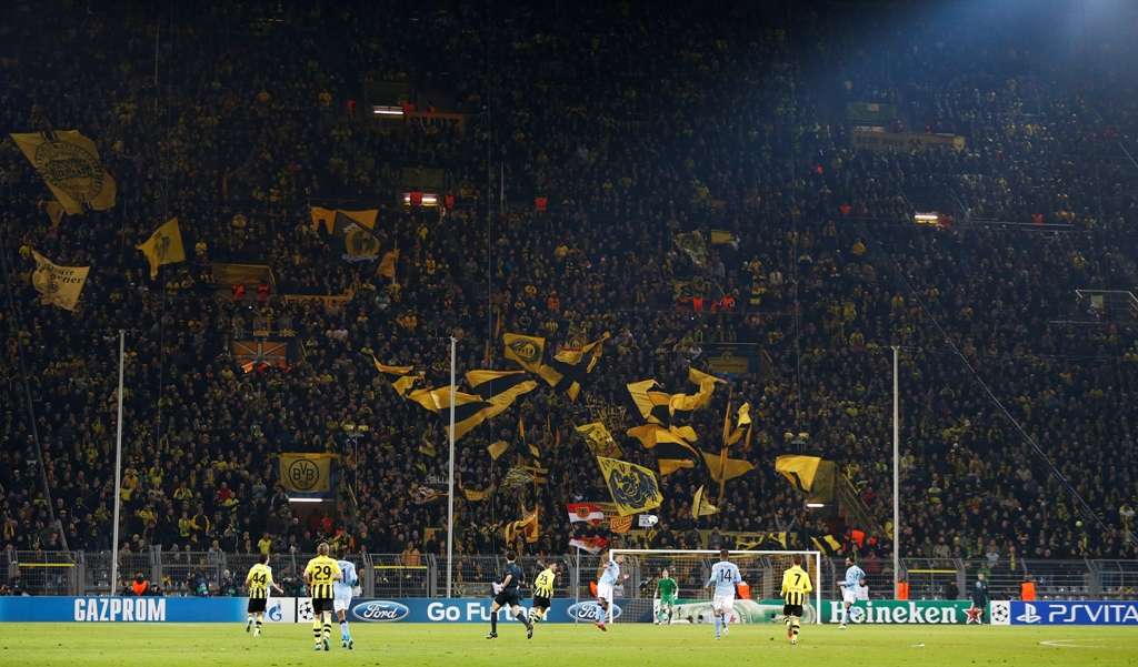 Dortmund's famous Yellow Wall: The safe standing terrace is reduced in size of Champions League, Europa League and international matches (Picture: Action Images)