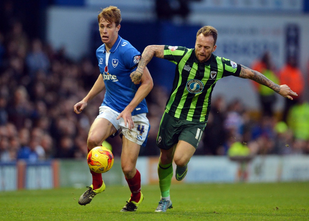 Wesbter (left) in action for his boyhood club Pompey last season (Picture: Action Images via Reuters)