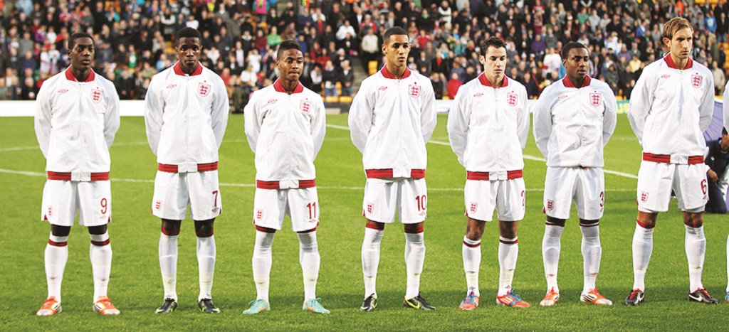 Racist Lair: England U21 players line up before the match in Serbia (Picture: Action Images)