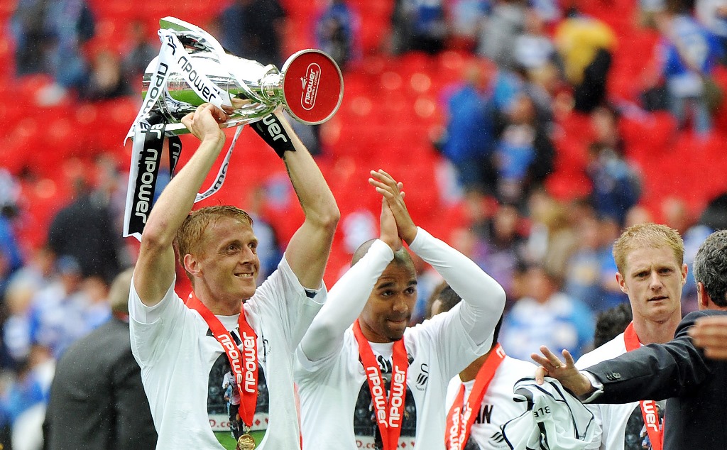 Glory days: Garry Monks celebrates Swansea City's promotion to the Premier League via the play-offs in 2011 (photo by Action Images / Adam Holt)