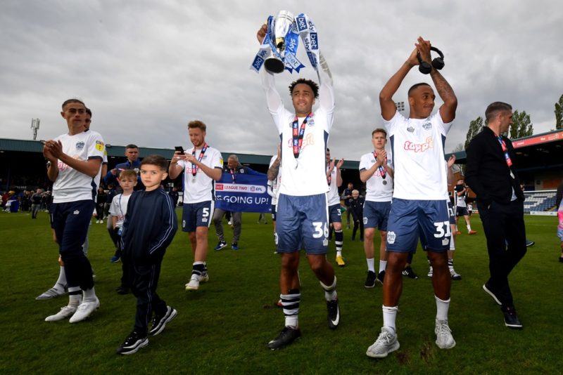 Bury players and manager Ryan Lowe celebrate