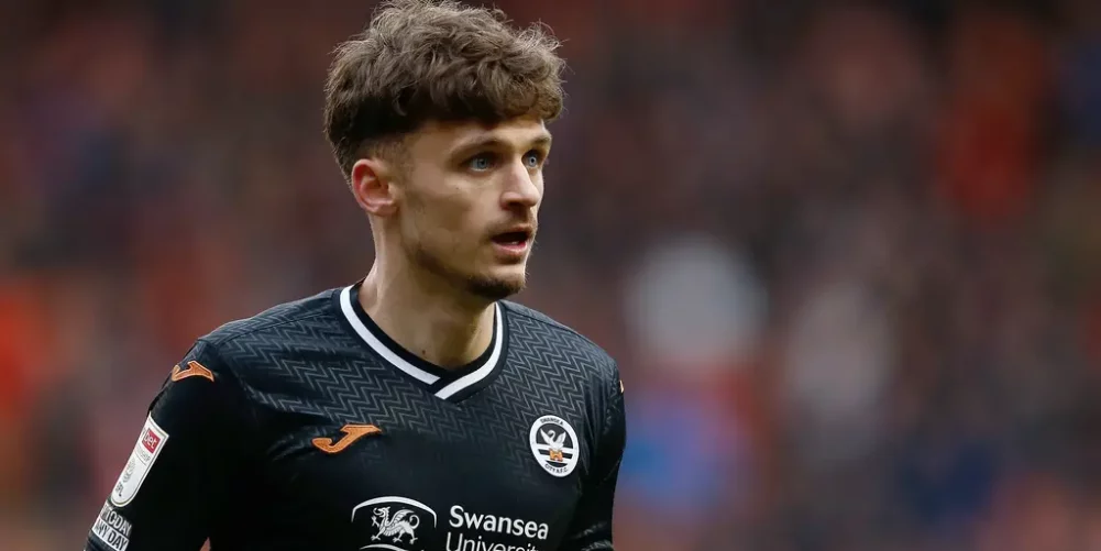 Midfielder Jamie Paterson extends his Swansea contract until the summer