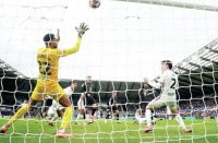 CUSHION: Burnley’s Jaidon Anthony scores the second PICTURE: Alamy