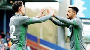 YOU BEAUTY: Cardiff City’s Yousef Salech, left, celebrates with Callum Robinson after opening the scoring PICTURES: Alamy