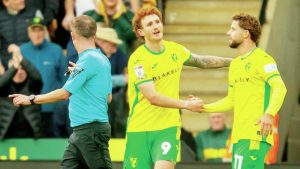 WELL DONE, PAL: Josh Sargent, left, takes the congratulations of Emiliano Marcondes after his late winner PICTURES: Alamy