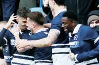 LATE SHOW: Mihailo Ivanovic celebrates his penalty winner with his team-mates PICTURES: Focus Images