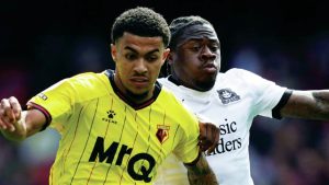 CLASH: Watford’s Ryan Andrews, left, and Plymouth’s Michael Obafemi do battle PICTURES: Alamy