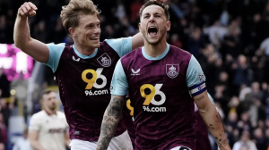 Josh Brownhill celebrates the eventual winning goal at Turf Moor to seal Burnley’s promotion to the Premier League (Nick Potts/PA)