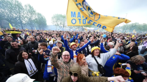 Leeds United fans celebrate the club's return to the Premier League (Mike Egerton/PA)