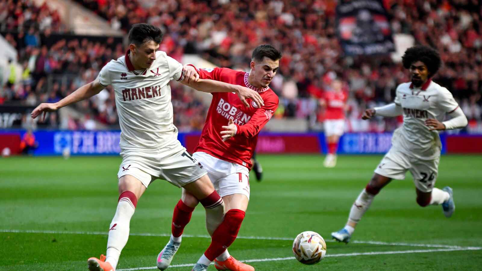Anis Mehmeti of Bristol City battling Sheffield United defender Anel Ahmedhodzic for the ball in the first leg action PICTURE: Alamy