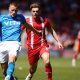 Leyton Orient’s Charlie Kelman goes up against Stockport County defender Fraser Horsfall PICTURE: Alamy