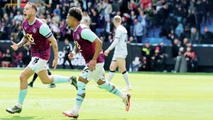 CAPTAIN MARVEL: Josh Brownhill, left, celebrates scoring his first goal against the Lions PICTURE: Alamy
