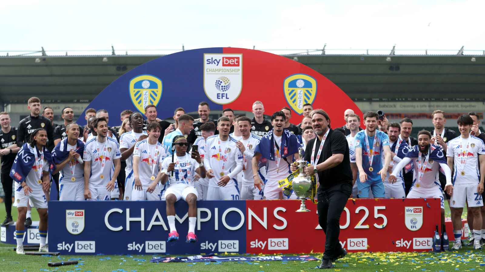 Leeds United boss Daniel Farke lifts the Championship trophy after victory over Plymouth Argyle PICTURE: Alamy