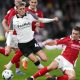 COMMITTED: Bristol City’s Adam Randell slides in to tackle Derby’s Bobby Clark PICTURE: Alamy