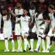 Bromley celebrate their penalty shootout win (John Walton/PA).