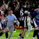 Grimsby goalkeeper Christy Pym (right) is congratulated by his team-mates (Nigel French/PA)