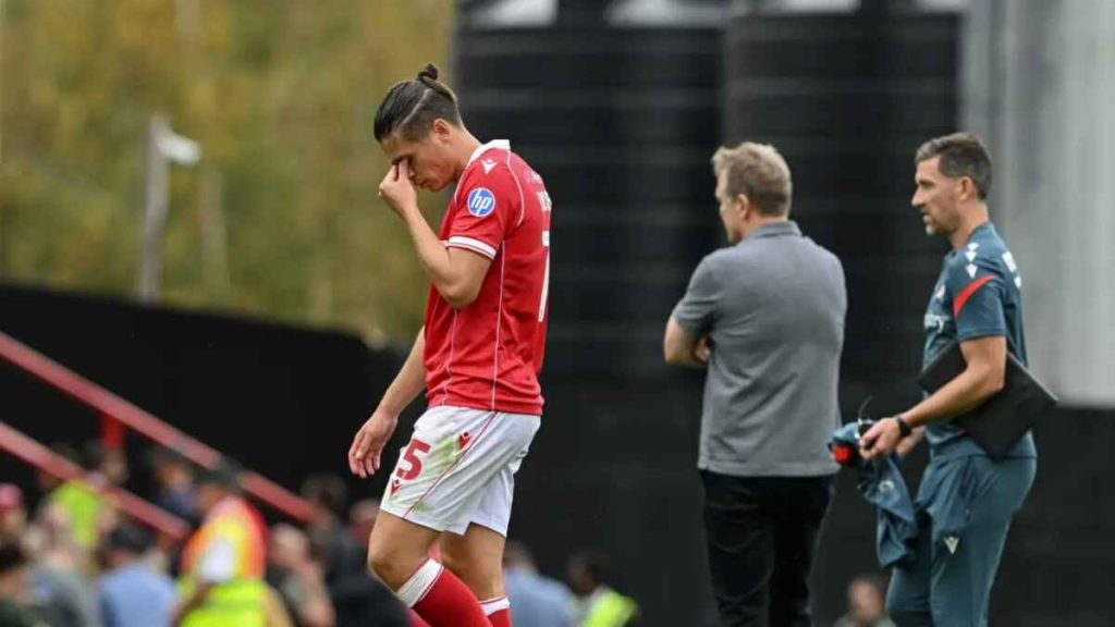Wrexham midfielder George Dobson (left) and manager Phil Parkinson reacted after the 2-2 draw against Sheffield Wednesday (Cody Froggatt/PA)