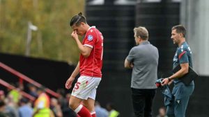 Wrexham midfielder George Dobson (left) and manager Phil Parkinson reacted after the 2-2 draw against Sheffield Wednesday (Cody Froggatt/PA)