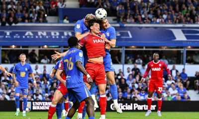 OUCH: Ipswich’s Jacob Greaves is outnumbered PICTURE: Alamy