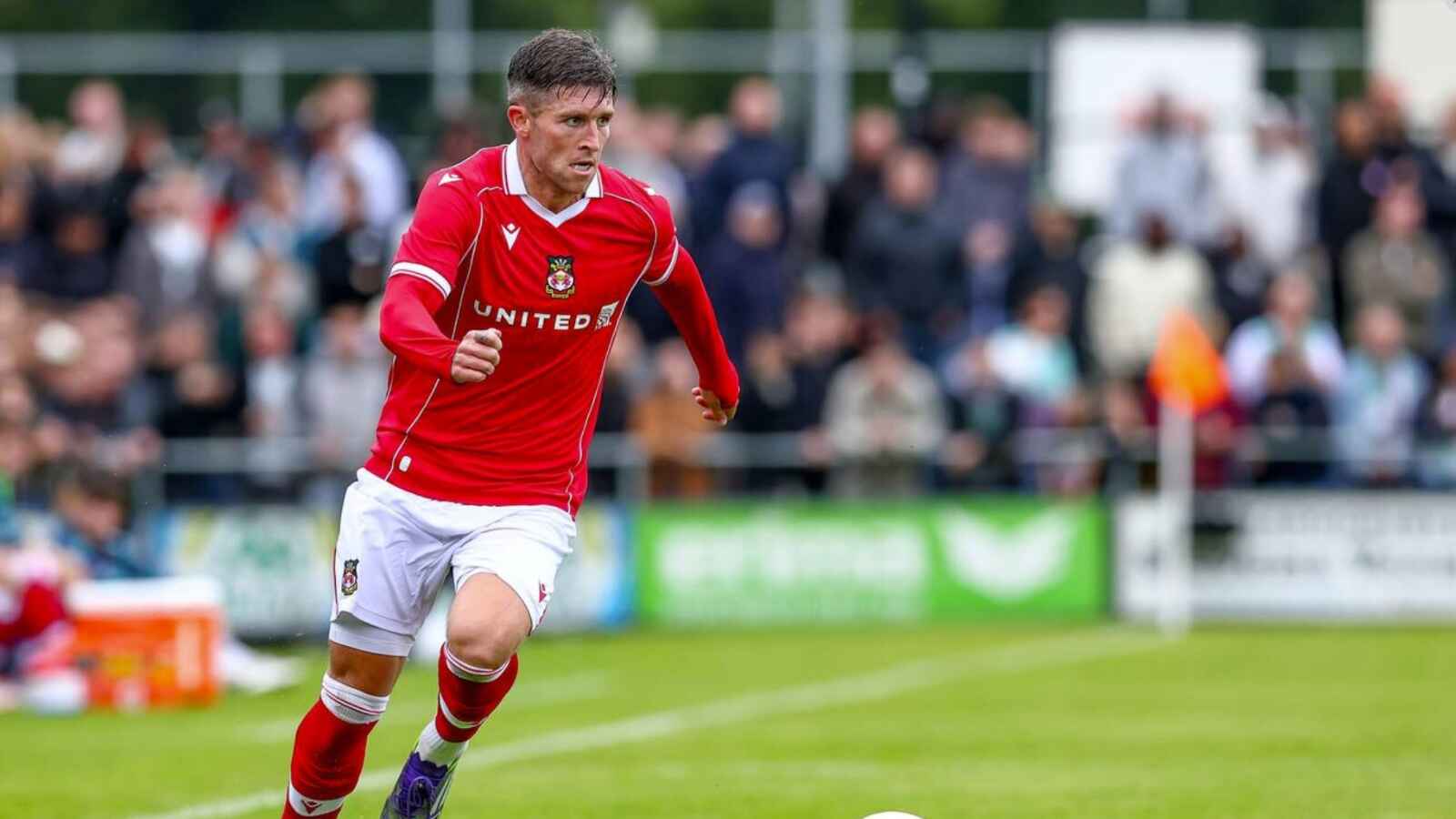 NEW COLOURS: Josh Windass in the red of Wrexham PICTURE: Alamy