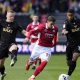 Bristol City’s Anis Mehmeti battles for the ball with Oxford's Brian De Keersmaecker and Brodie Spencer