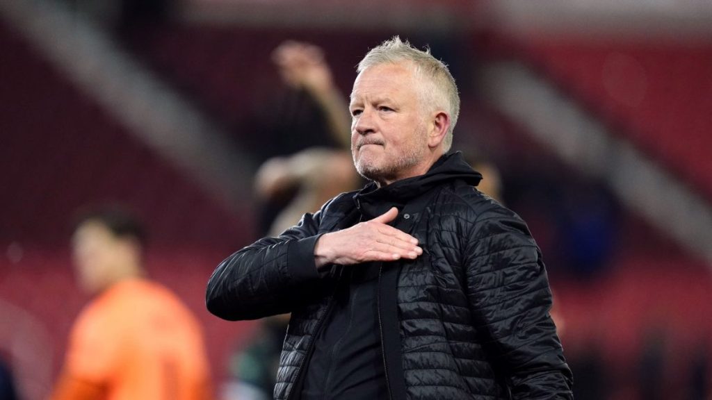 Chris Wilder puts his hand on his heart as he salutes the Sheffield United fans