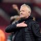 Chris Wilder puts his hand on his heart as he salutes the Sheffield United fans
