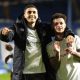 Grimsby's Jaze Kabia, left, and George McEachran celebrate success at Sheffield Wednesday