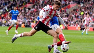 Southampton’s Tom Fellows battles for the ball against Portsmouth