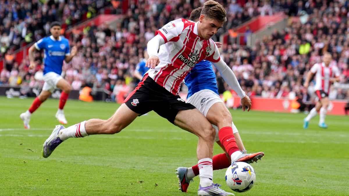 Southampton’s Tom Fellows battles for the ball against Portsmouth