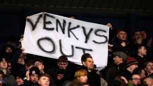 Blackburn Rovers fans with a protest banner against their owners last season