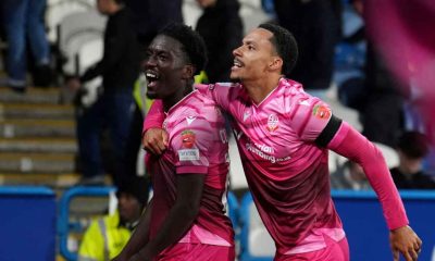 Amario Cozier-Duberry celebrates his last-gasp winner with team-mate Josh Dacres-Cogley