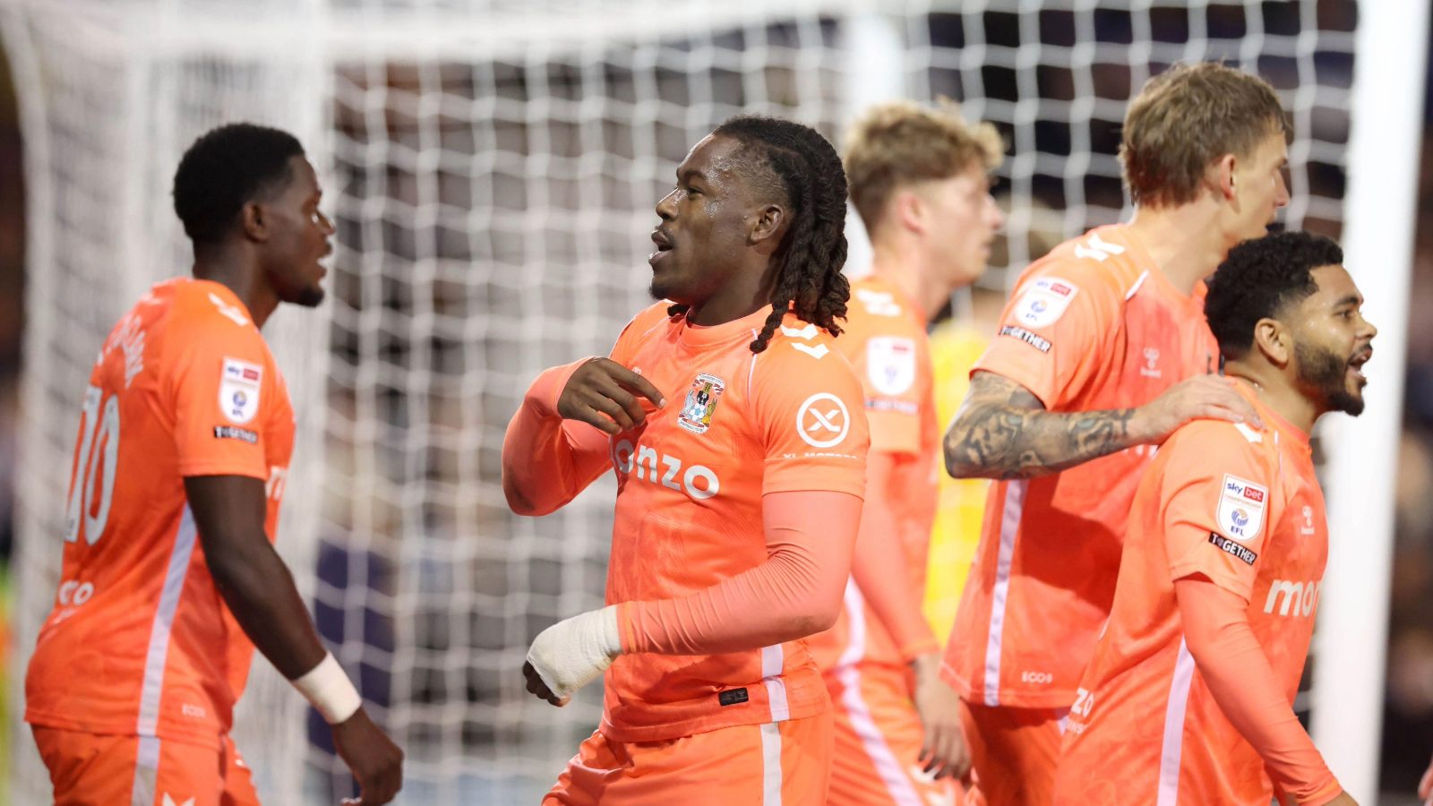 Brandon Thomas-Asante celebrates with his teammate