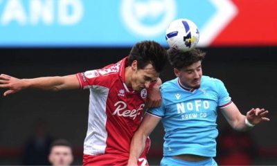 Crawley Town’s Josh Flint, left, and Walsall’s Jamie Jellis do battle
