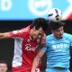 Crawley Town’s Josh Flint, left, and Walsall’s Jamie Jellis do battle