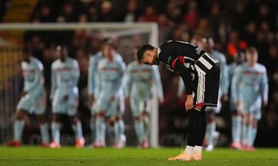 Grimsby Town’s Jaze Kabia adjusts his socks