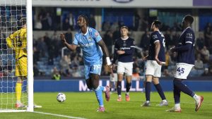 Haji Wright celebrates